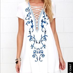 Lulu’s white shirt dress with lace up deep v